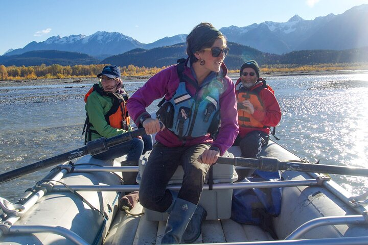 River guide Lizi navigating the braided channels of a glacial river in the Chilkat Bald Eagle Preserve